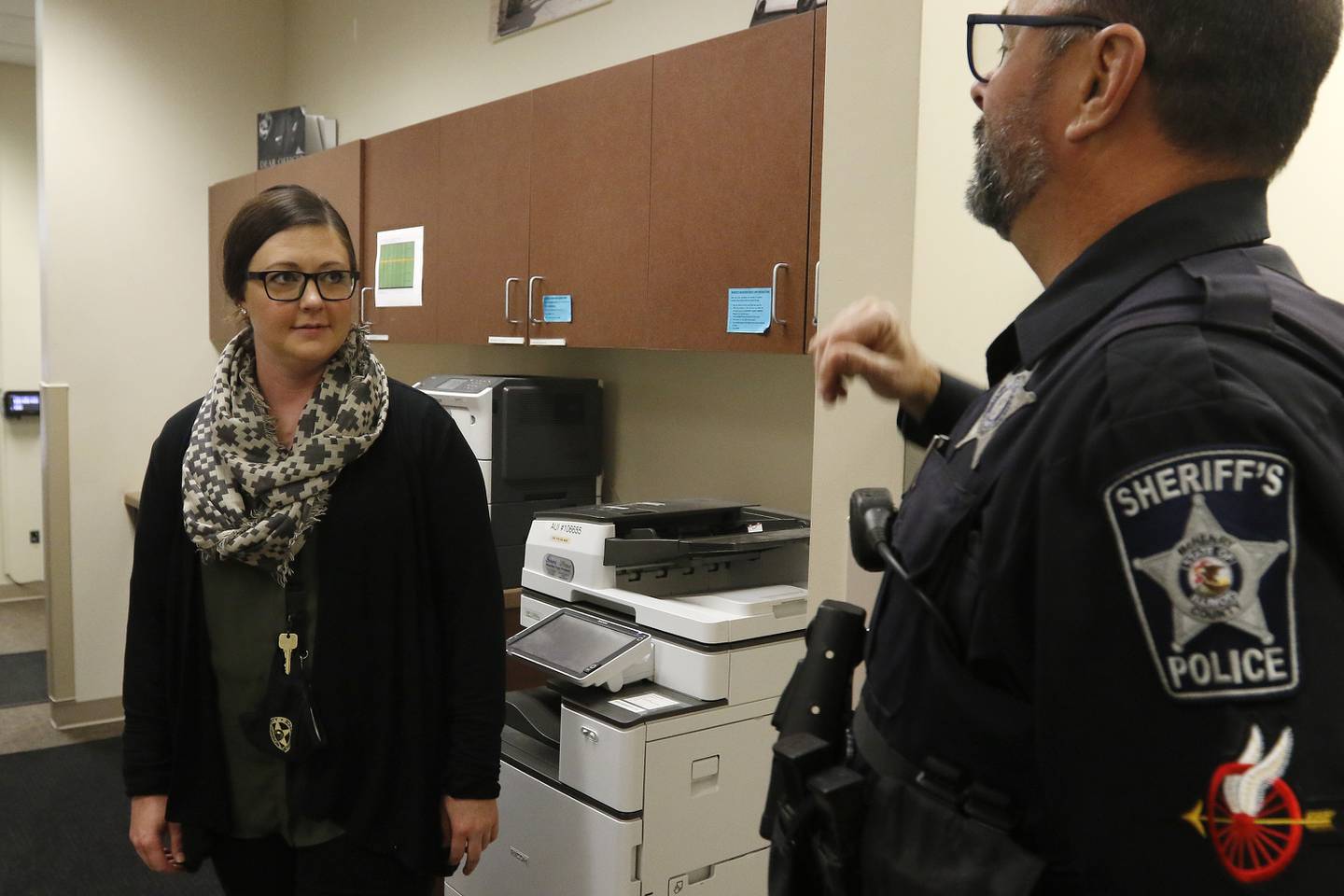 Police social worker Alana Bak poses for a portrait with Deputy Tim Creighton at the McHenry County Sheriff's Office on Wednesday, Nov. 10, 2021, in Woodstock.