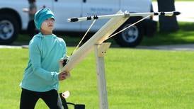 Kids use homemade catapults in science project