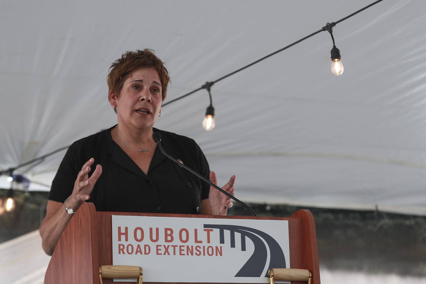 Will County Executive Jennifer Bertino-Tarrant speaks at the Houbolt bridge ground breaking ceremony on Tuesday, July 20, 2021, at 3000 block of Channahon Rd. in Joliet, Ill. A groundbreaking ceremony was held to celebrate the Houbolt Rd. bridge being built over the Des Plaines River.