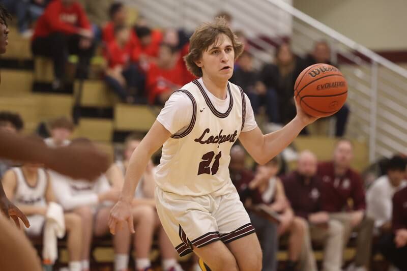 Lockport’s Bryce Turner passes against Oswego.