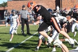 Byron defense quiets IC Catholic’s aerial attack, Tigers advance to Class 3A semis