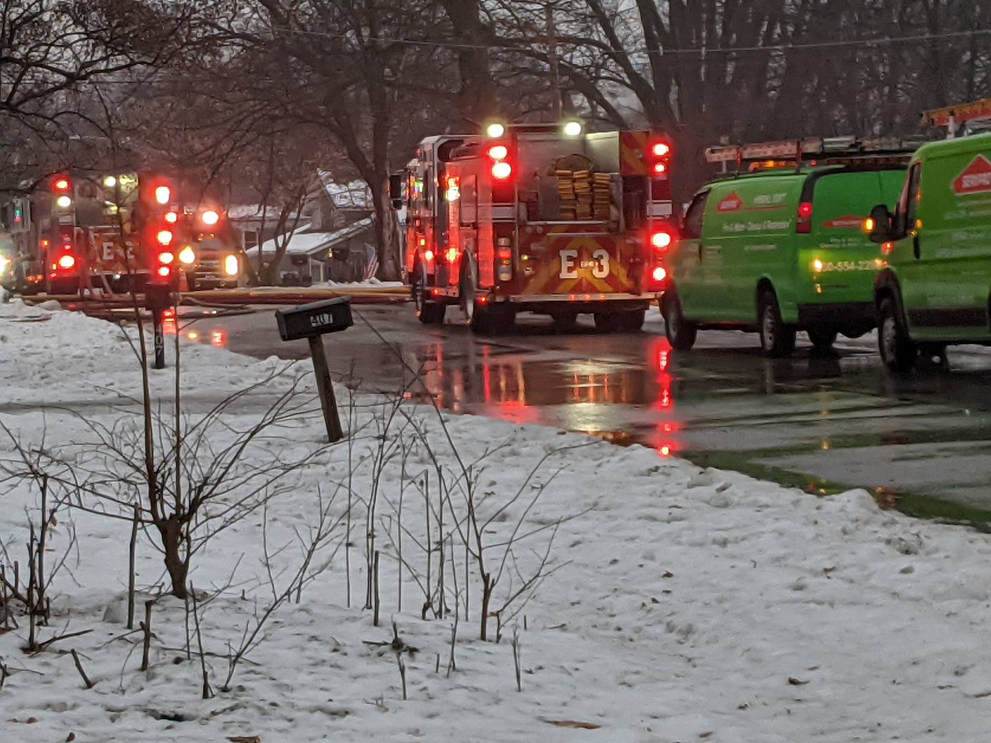 Firefighters remain on the scene at 407 Main St. near downtown Oswego. Built in the 1900s, the house is called The Pillars because of the 36 pillars located in and around the house.