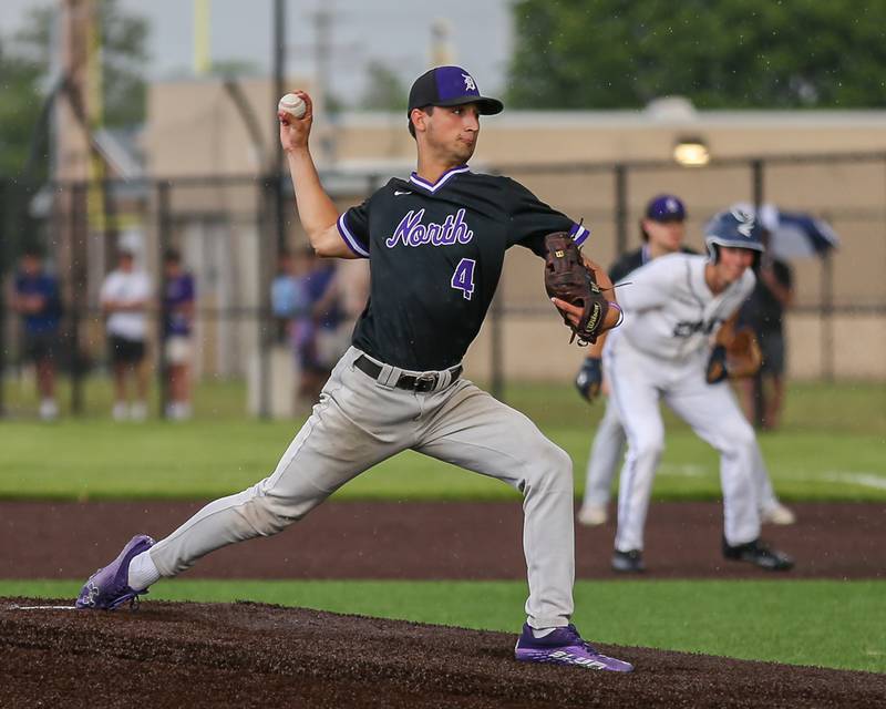 Downers Grove North's Joseph Chiarelli (4) delivers to the plate during Class 4A Romeoville Sectional semifinal between Oswego East at Downers Grove North.  May 31, 2023.