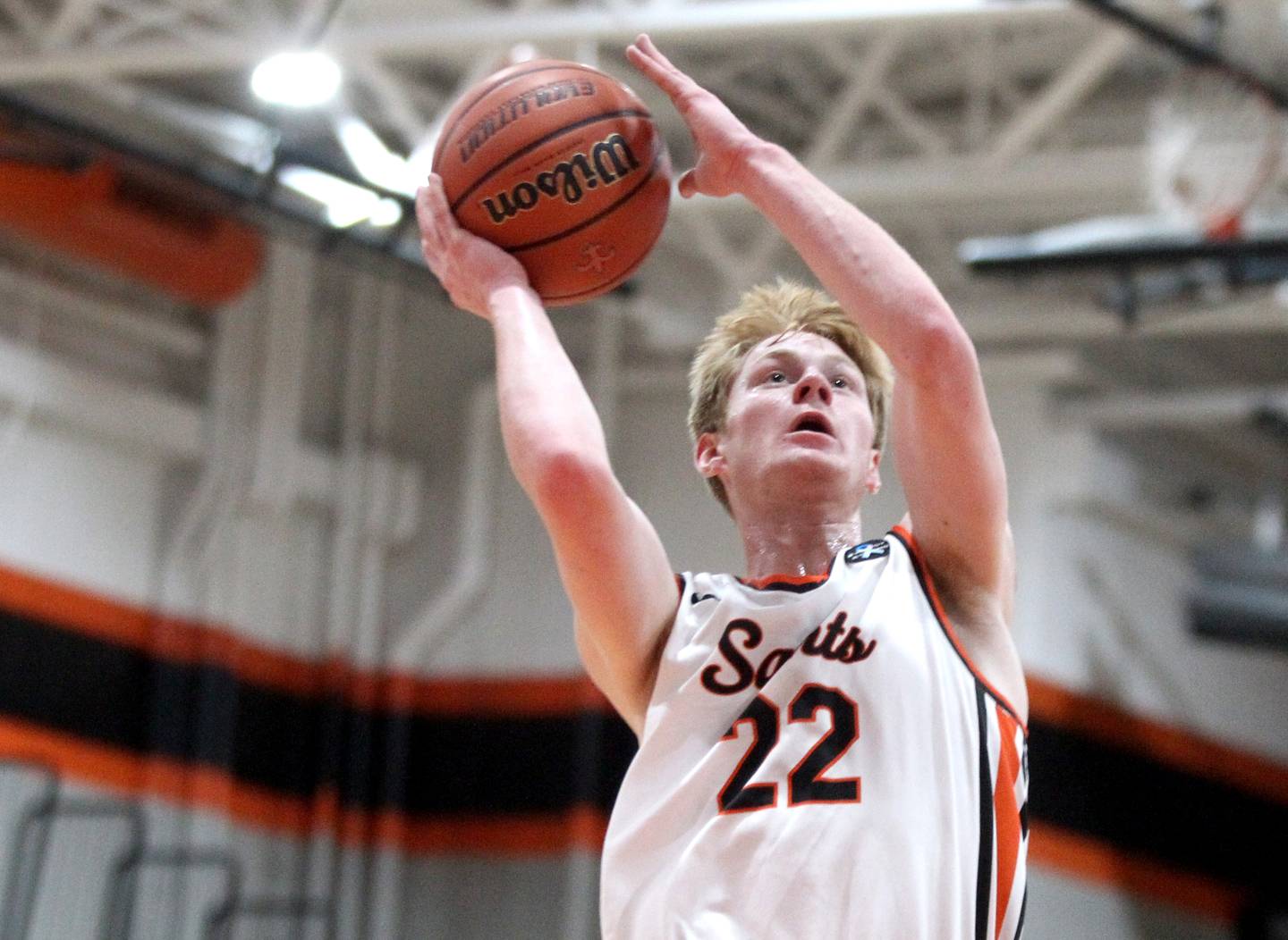 St. Charles East’s Brad Monkemeyer (22) puts the ball up during a game against East Aurora in the 63rd Annual Ron Johnson Thanksgiving Tournament at St. Charles East on Monday, Nov. 21, 2022.