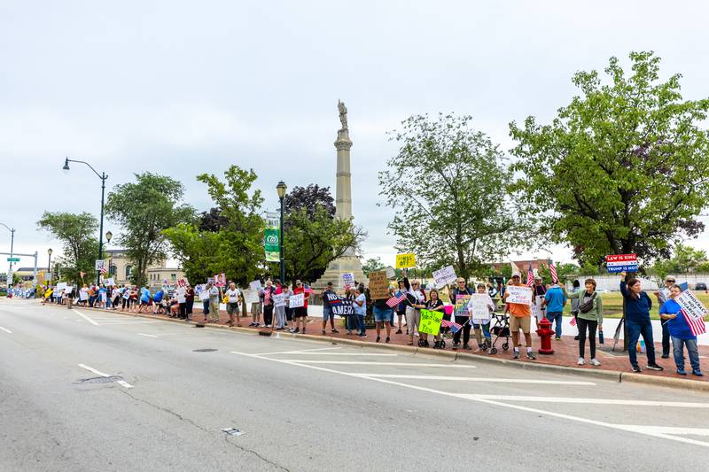 Attendees line Jefferson Street in Downtown Joliet during the Good Trouble Lives On event on July 17, 2025.