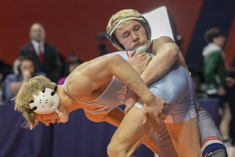 Coal City’s Cooper Morris (front) and Vandalia’s Tyson Waughtel compete in the 126 pound weight class of the 1A state individual wrestling finals Saturday, Feb. 22, 2025, at State Farm Center in Champaign.