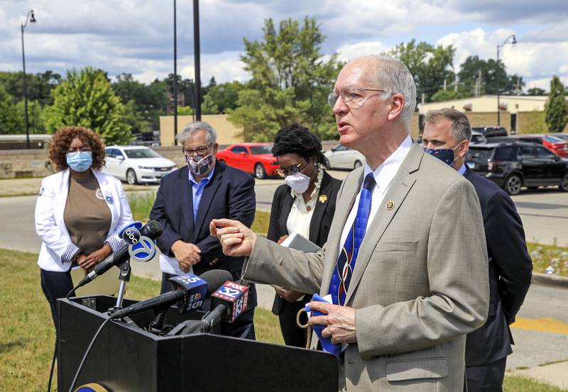 Congressman Bill Foster, D-Naperville, can be seen speaking to the media Tuesday, Aug. 18, 2020, at the Ken Christy Post Office in Aurora, Ill., during a press conference condemning President Donald Trump's effort to limit the United States Postal Service.
