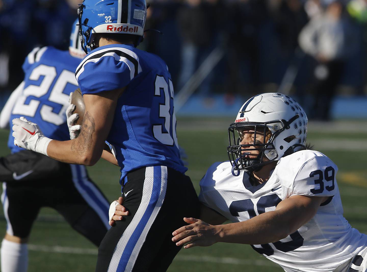 Cary-Grove's Holden Boone hits Lake Zurich's Nikolay Oblakov as Oblakov tries to return a kickoff during a IHSA Class 6A semifinal playoff football game on Saturday, Nov. 18, 2023, at Lake Zurich High School.