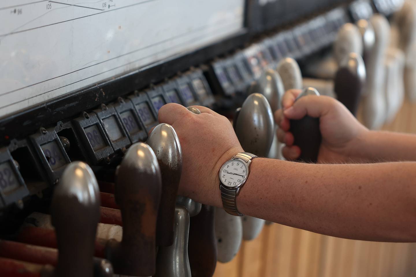 Greg Peerbolte, CEO Joliet Historical Museum, works the pistol grips that would allow train movement through the intersections at the train museum in the Old Union Depot Tower at the Joliet Gateway Center station on Thursday, May 11, 2023 in Joliet.