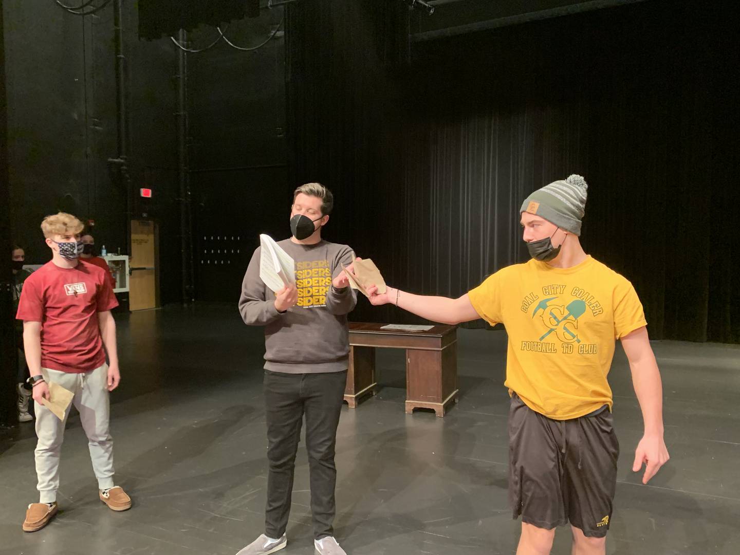 Theatre students and performers, Stephen Byers, left, and Derek Carlson, right, take instruction from Coal City High School theatre director Jack Micetich.