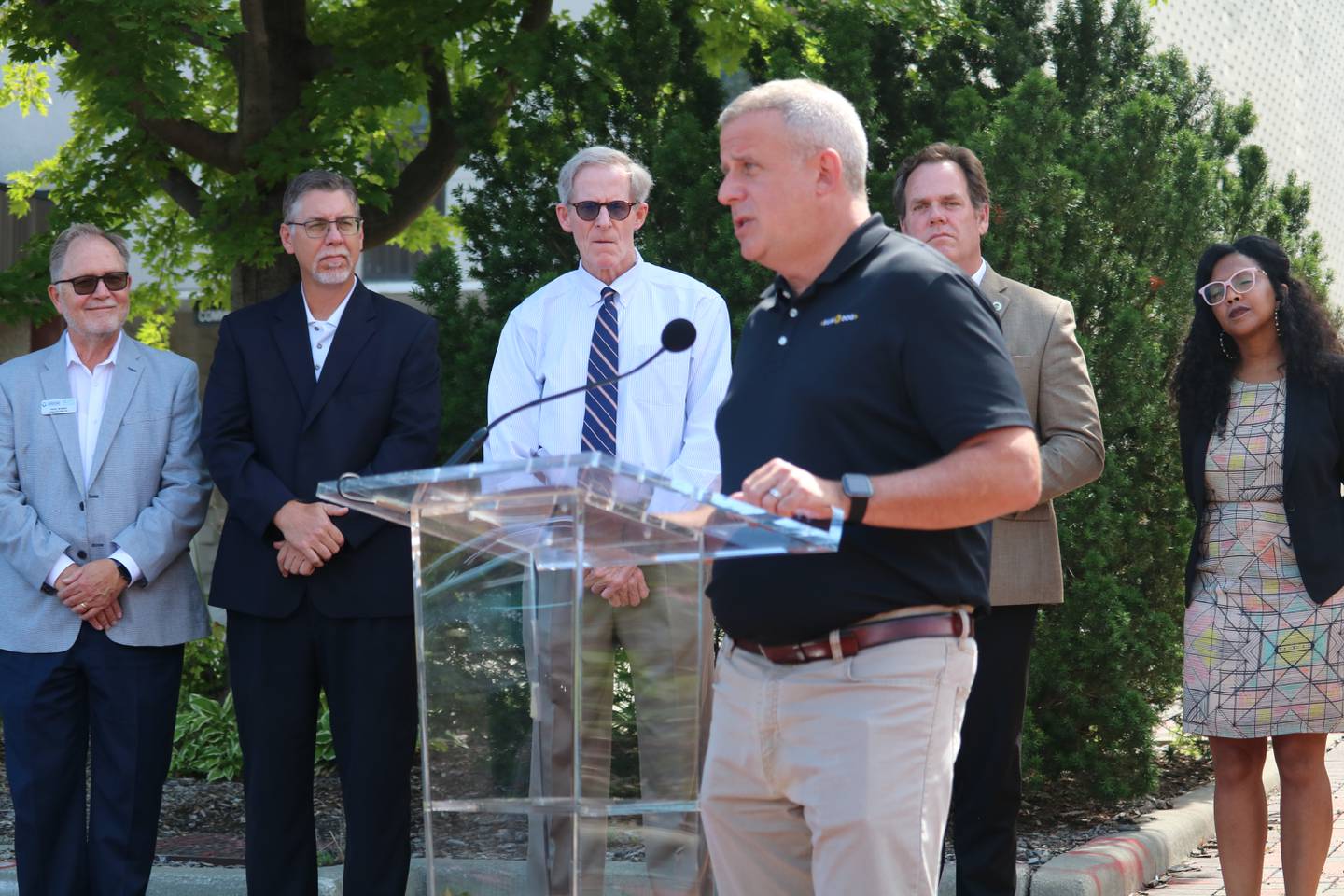 DeKalb Mayor Cohen Barnes gives remarks during an Aug. 2, 2022 press conference. The event also featured a ribbon cutting to celebrate the completion of an electric vehicle charging station in the city's downtown.