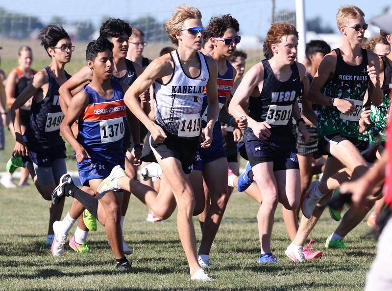 Kaneland’s Evan Nosek leaves the starting line Tuesday, Sept. 3, 2024, during the Sycamore Cross Country Invite at Kishwaukee College in Malta.