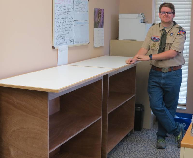 Charlie Coyle of Sycamore, member of Boy Scout Troop 2810, working on his cabinet building Eagle project