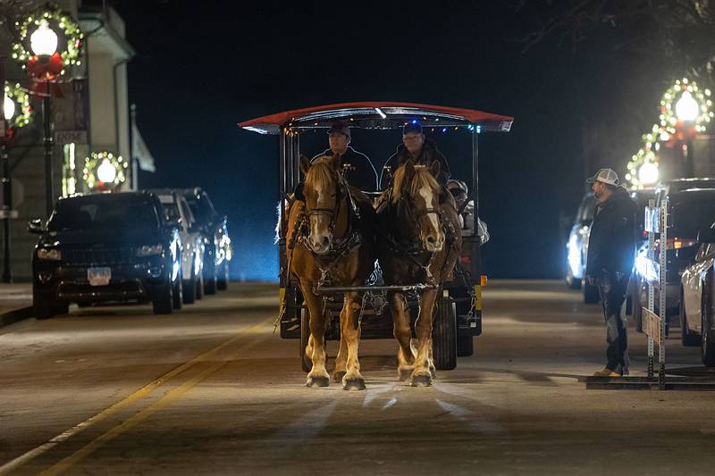 'Discover Dixon' worked hard to provide entertainment and horse drawn carriage rides during the Dixon Christmas walk Friday Dec. 2, 2022.