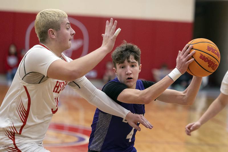 Dixon’s Brody Nicklaus drives to the hoop against Oregon’s Kade Girton Tuesday, Feb. 4, 2025, in Oregon.