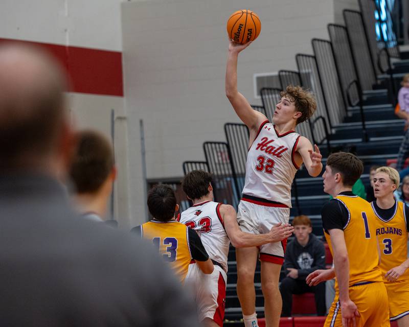 Chase Serling (32) of Hall pulls up for midrange shot as Head Coach Mike Filippini watches on in the championship game of the Colmone Classic on Saturday, December 20, 2025 at Hall High School in Spring Valley.