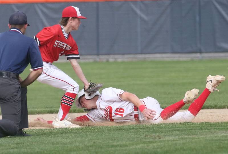 Ottawa's George Shumway is tagged out by Streator's Keegan Angelico while trying to steal second base during the Class 3A Regional semifinal game on Thursday, May 29, 2025 at Pontiac High School.