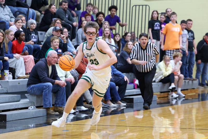 Bishop McNamara's Callaghan O'Connor breaks away with a steal en route to a dunk during the Fightin' Irish's 66-52 victory over El Paso-Gridley in the IHSA Class 2A Herscher Regional championship on Friday, Feb. 27, 2026.