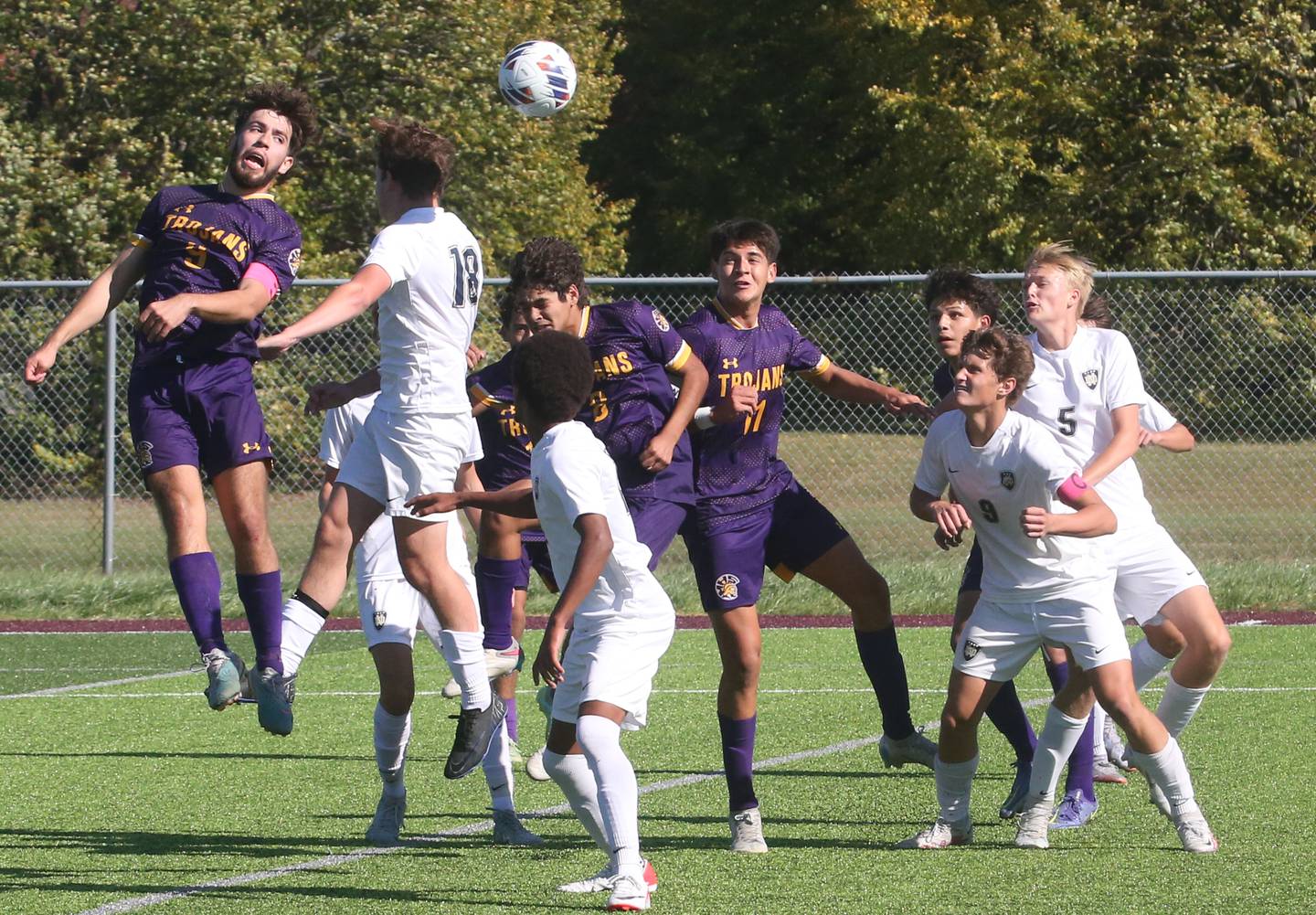 Mendota's David Casas (left) puts a header on the ball to score a goal over Quincy Notre Dame's Alex Strong in the second overtime period during the Class 1A Sectional semifinal game on Saturday, Oct. 21, 2023 at Illinois Valley Central High School in Chillicothe.