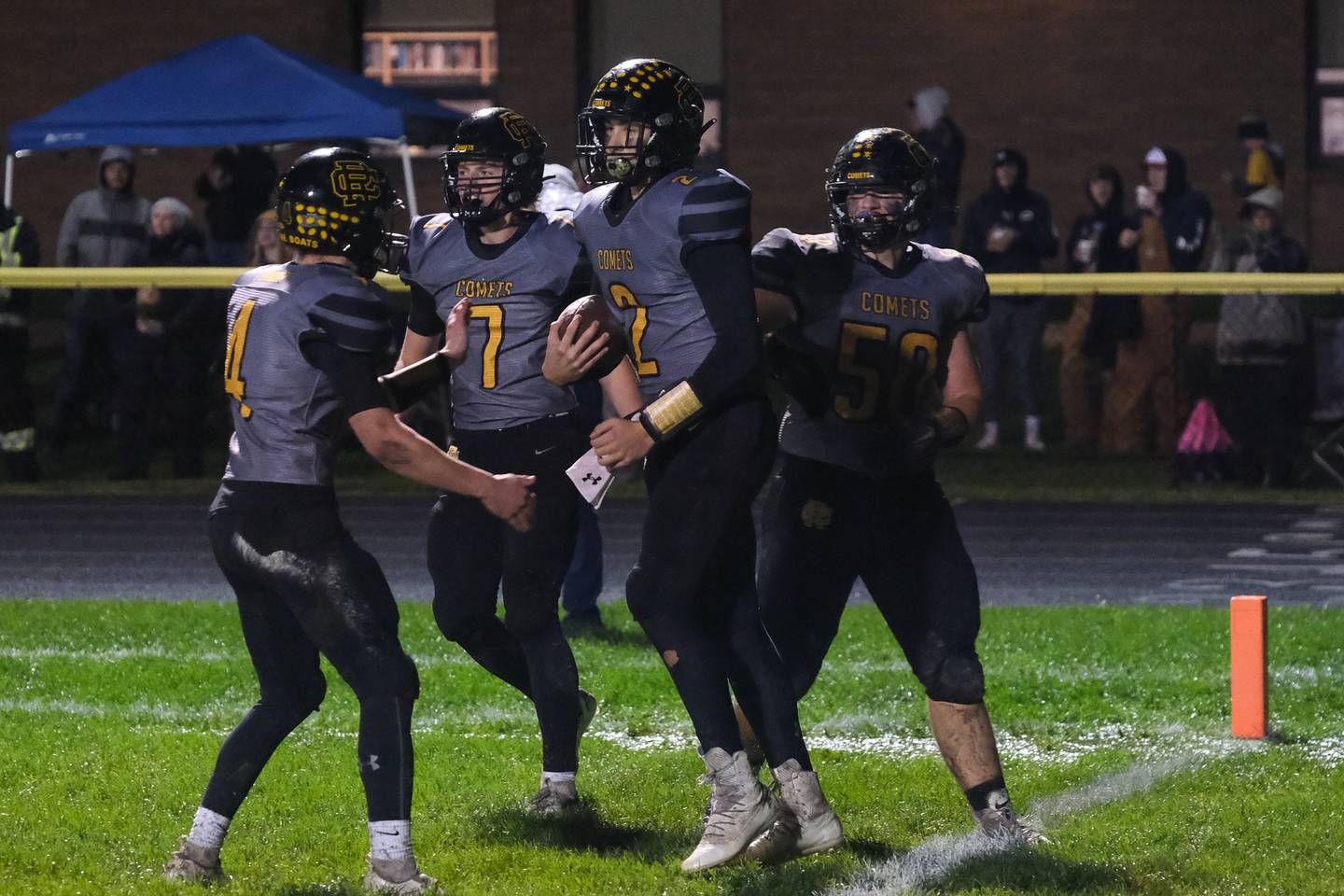 Reed-Custer's Jake McPherson celebrates a touchdown against Peotone in the first round of the Class 3a playoffs at Reed-Custer High School on Friday, Oct. 29, 2021 in Braidwood.