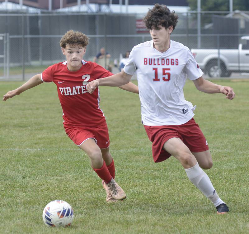 Ottawa’s Nathan Underhill and Streator’s Landon Zaragoza give chase to the ball in the 1st half of Saturday’s match at Ottawa.