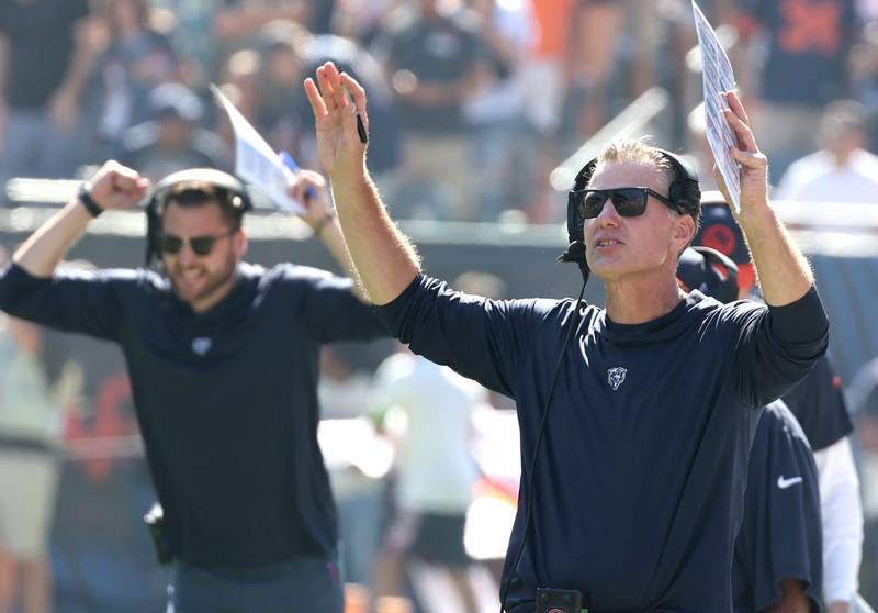 Chicago Bears Head Coach Matt Eberflus signals touchdown after it is confirmed by replay that DJ Moore caught the ball inbounds during their game against the Denver Broncos Sunday, Oct. 1, 2023, at Soldier Field in Chicago.