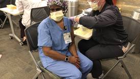 Health care staff at Will County hospitals doing well after first shot of Pfizer vaccine