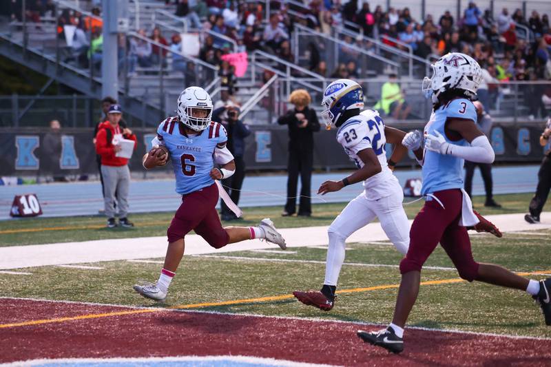 Kankakee's Zayden Henley runs in a touchdown during the Kay's victory over Bloom on Friday, Oct. 10, 2025.