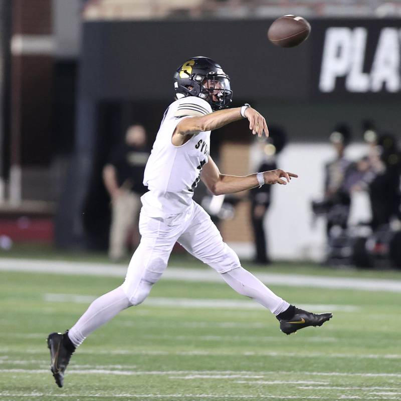 Sycamore's Elijah Meier throws the ball on the run during the First National Challenge against DeKalb Friday, Aug. 26, 2022, in Huskie Stadium at Northern Illinois University in DeKalb.
