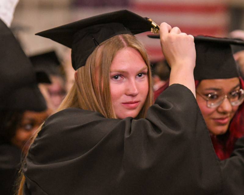 Sycamore graduate Molly Allison moves her tassel to the other side of her cap signifying the completion of the graduation ceremony on Sunday May 24, 2026, held at Sycamore High School.