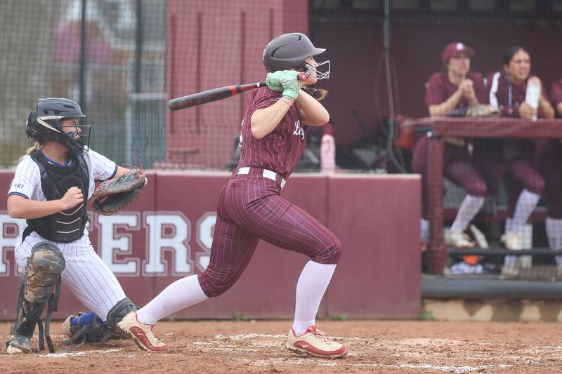 Lockport’s Alexis Vander Tuuk connects for a a two run double against Lincoln-Way East on Monday, April 13, 2026 in Lockport.