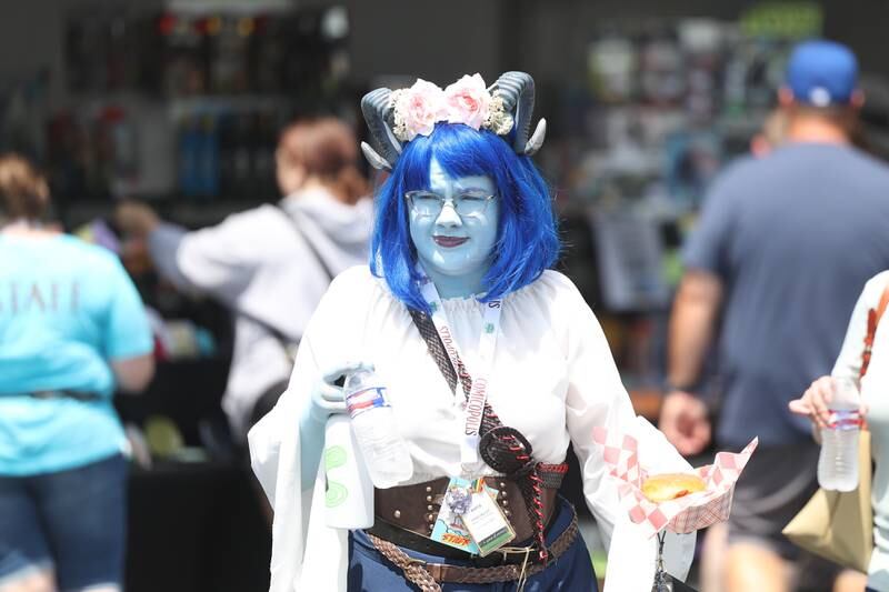 Katie Deters, dressed as Jester from Critical Role, attends Comicolopis, Lockport’s 7th annual Comic and Fandom Con on Saturday, July 29.
