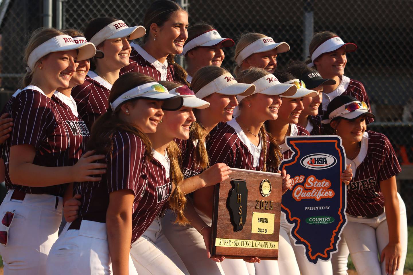 Prairie Ridge’s Wolves celebrate a win over Antioch in IHSA Class 3A Supersectional softball action at Kaneland High School in Maple Park on Monday, June 9, 2025.