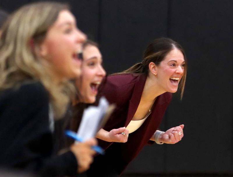 Prairie Ridge’s Head Coach Leah Groat and coaches and players get revved up as the Wolves polish off a win against St. Viator in IHSA Class 3A Super-Sectional girls volleyball at Streamwood High School in Streamwood on Monday, November 10, 2025.