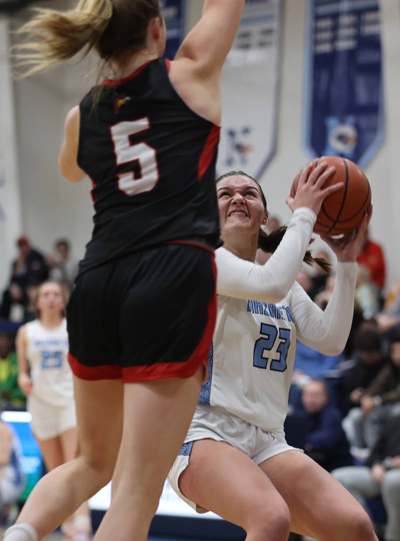 Nazareth's Danielle Scully (23) goes up to the basket during the girls varsity basketball game between Benet and Nazareth academies on Wednesday, Jan. 3, 2023 in La Grange Park, IL.