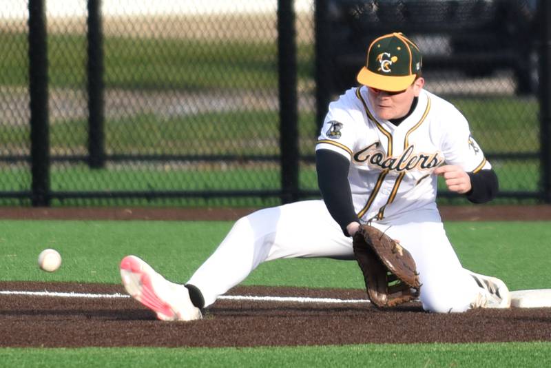 Coal City's Ethan Olson fields a throw at first base during a home game against Bishop McNamara Thursday, April 3, 2025.