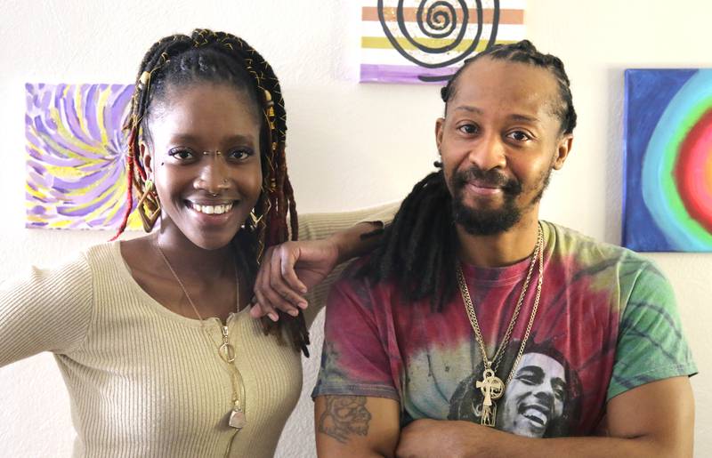 Hair stylist Mariyah Ofei and DeKalb resident Michael Calhoun after Ofei styled Calhoun's locks Thursday Feb. 24, 2022, in her home studio in DeKalb. Ofei, who sports locks herself, specializes in working with others who also have locks.