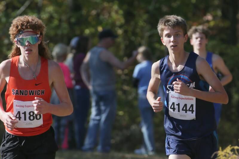Sandwich's A.J. Parkinson and Bureau Valley's Maddox Moore run in the Class 1A Regional Cross Country boys race on Saturday, Oct. 22, 2022 at the Seneca FFA Farm in Marseilles.