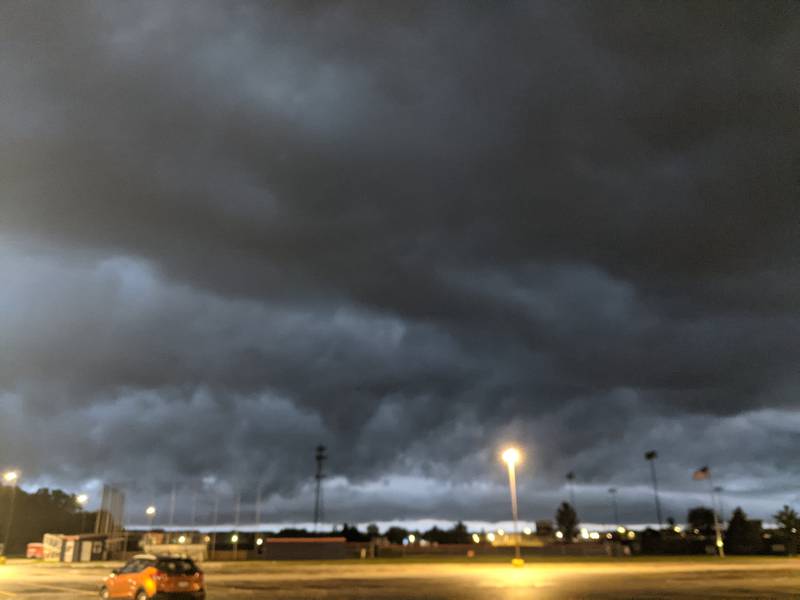 Storm clouds form over Oswego High School prior to torrential rains on Aug. 18, 2025.