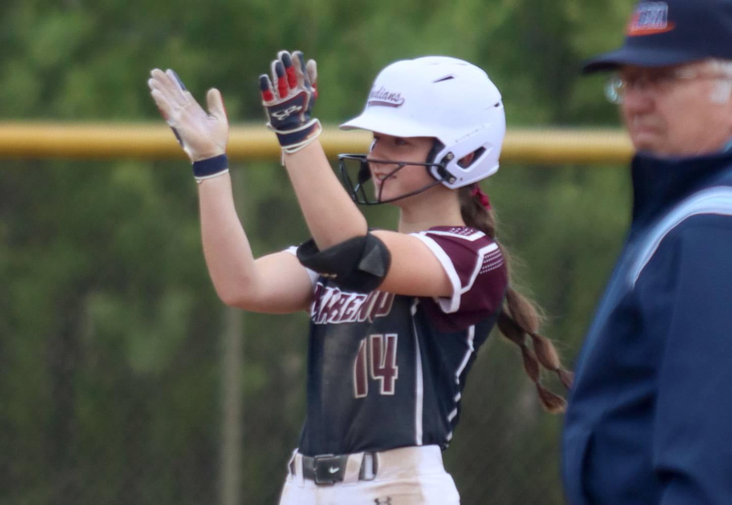 Marengo’s Abby Balmes celebrates a double against Aurora Central Catholic in varsity girls softball IHSA Class 2A Regional Title Game action on Friday, May 22, 2026 at Raymond Benoy Field on the campus of Marian Central High School in Woodstock.