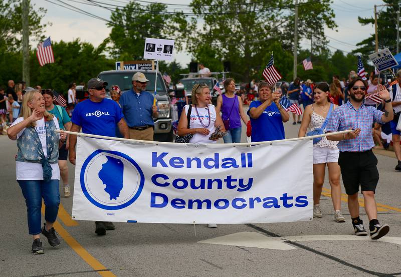 Kendall County Democrats march in the Yorkville Independence Day Parade on Friday, July 4, 2025.
