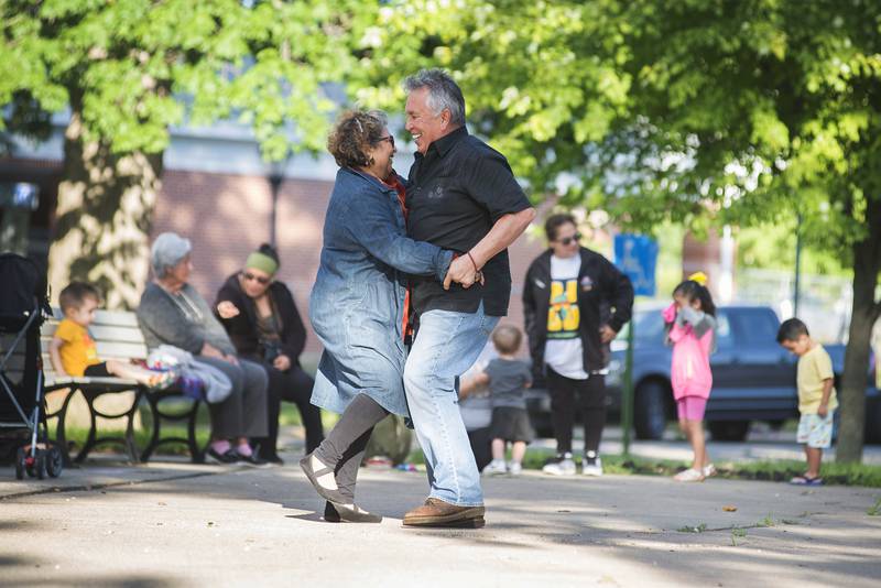 Ilia and Andres Quintana of Sterling dance and smile to the music of Mariachi Campiranos Wednesday, June 8, 2022 in Sterling. The band opened the evening of music for the Sterling Municipal Band's weekly concert series.