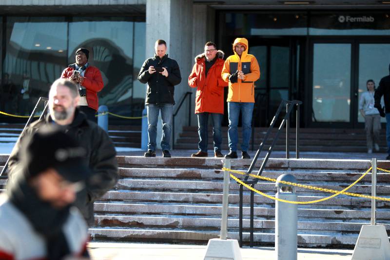 Onlookers watch as Fermi National Accelerator Laboratory (Fermilab) moved a 95-ton coldbox on Wednesday, Jan. 15, 2025, following a two month journey from France to Batavia. The coldbox is a crucial piece of equipment for the lab’s new Proton Improvement Plan II (PIP-II) particle accelerator project.
