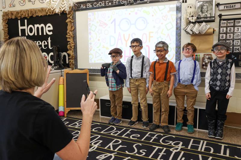 Shabbona Elementary School kindergartener boys in Randi Martin's class gather for a photo in their 100-year-old outfits during the 100th day of school on Monday, Feb. 9, 2026.