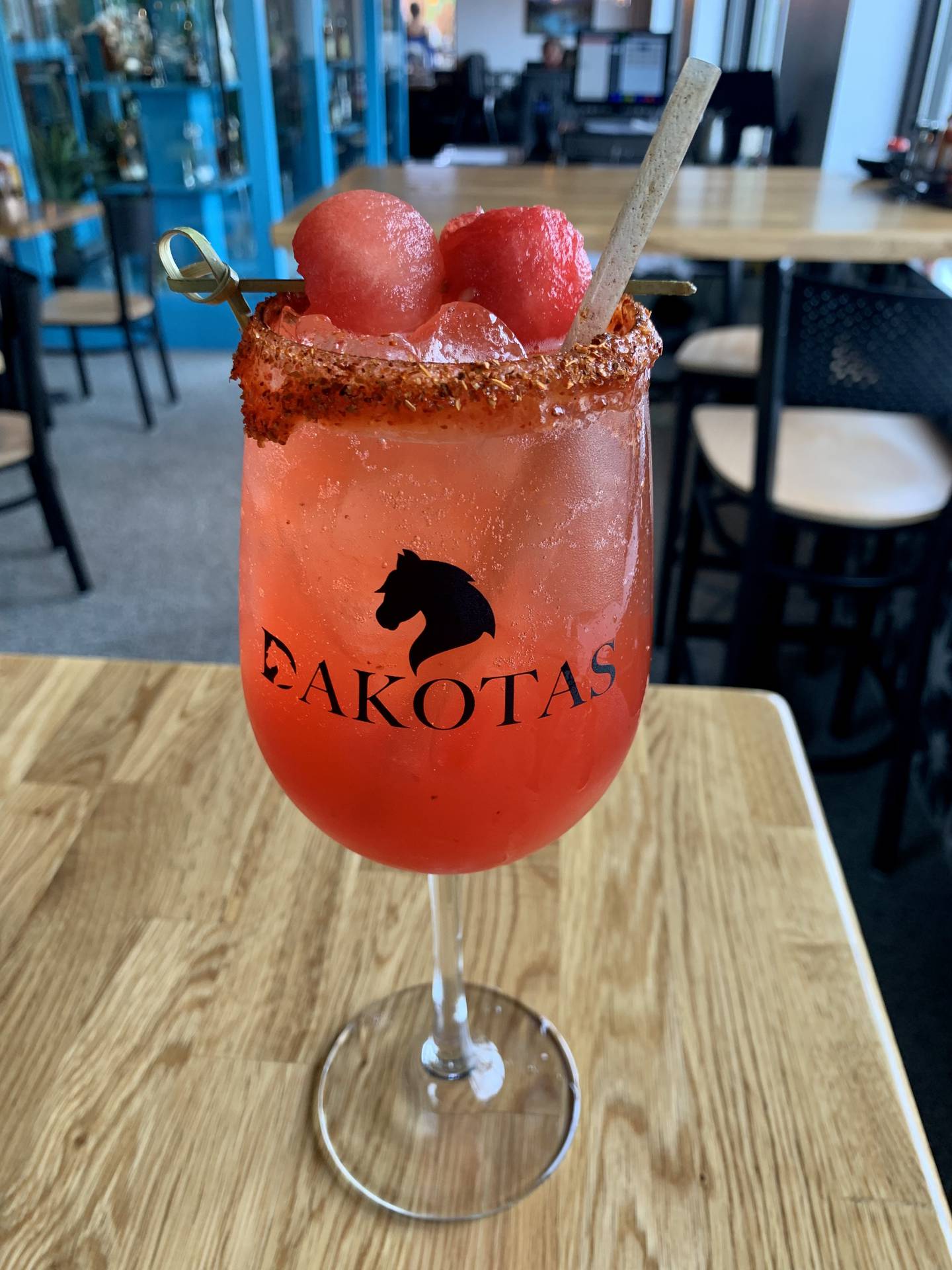 Watermelon Sugar High is like a watermelon margarita with a kick. The tequila based cocktail is topped with Celcius energy drink and rimmed with spicy chamoy.