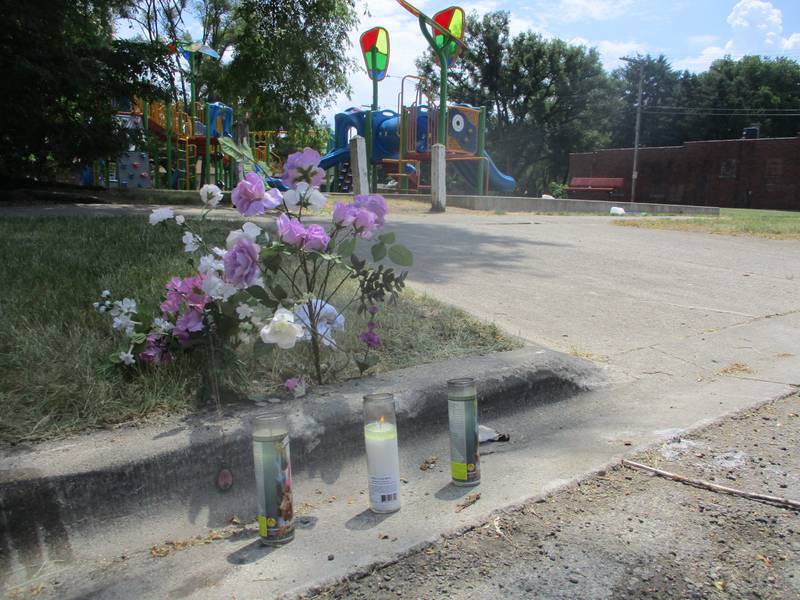 A memorial marks the spot where a 16-year-old was gunned down the night of Tuesday, May 30, 2023, in Joliet.