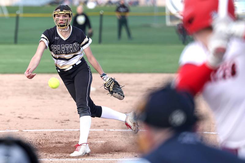 Sycamore's Bella Jacobs delivers a pitch to an Ottawa batter during their game Friday, April 21, 2023, at Sycamore High School.