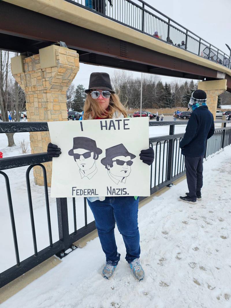 One protestor recalls 1980 'The Blues Brothers' movie while protesting the latest ICE killing in Minnesota of Alex Pretti, an ICU nurse Sunday, Jan. 15, 2026.