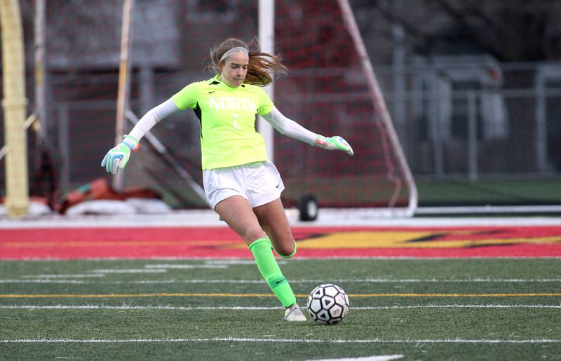 Wheaton North goalkeeper Zoey Bohmer kicks the ball during a game at Batavia on Thursday, April 7, 2022.