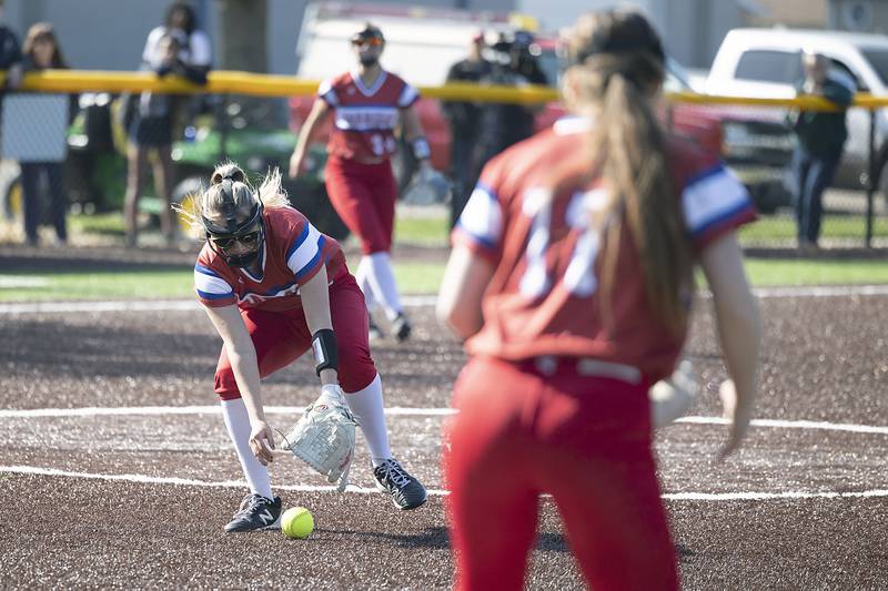 Morrison’s Jordan Eads fields a ball off the mound against Sterling Wednesday, April 26, 2023.